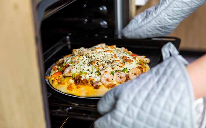 Una pizza al horno, un tipo de cocción Una pizza al horno, un tipo de cocción