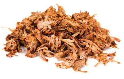 Pedazos de pulled pork desemechados Montón de pedazos de pulled pork desmechados