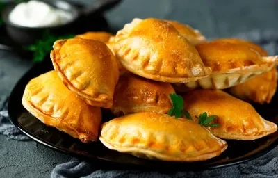 Mini panzerotti con queso y champiñones Mini panzerotti con queso y champiñones