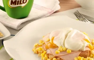HUEVOS POCHADOS ACOMPAÑADOS CON MILO® CALIENTE HUEVOS POCHADOS ACOMPAÑADOS CON MILO® CALIENTE
