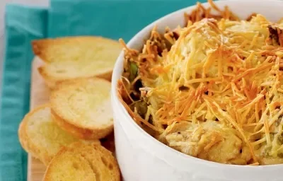 GRATINADO DE ALCACHOFAS Y ESPINACAS CON TOSTADAS