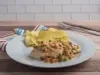 Filetes de pollo guisados con vegetales y crema